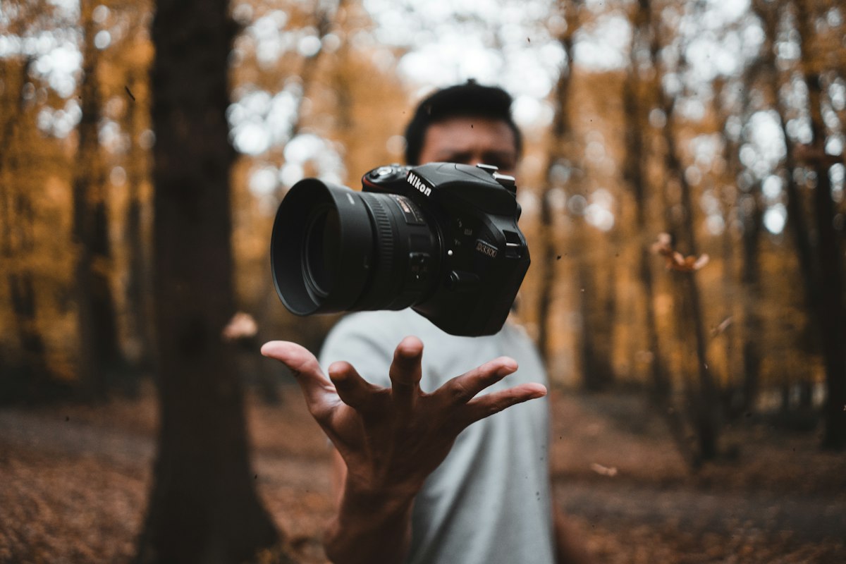 Camera with before and after images showing AI photo enhancement