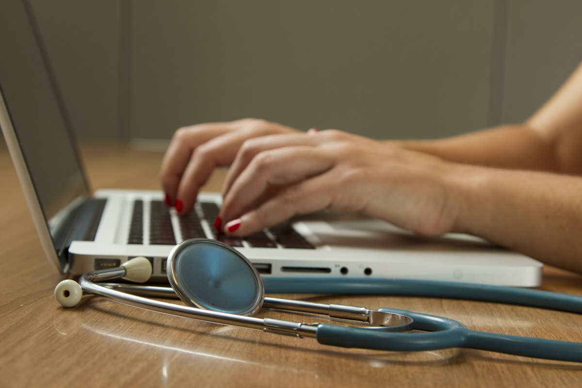 Doctor using digital tablet with artificial intelligence technology