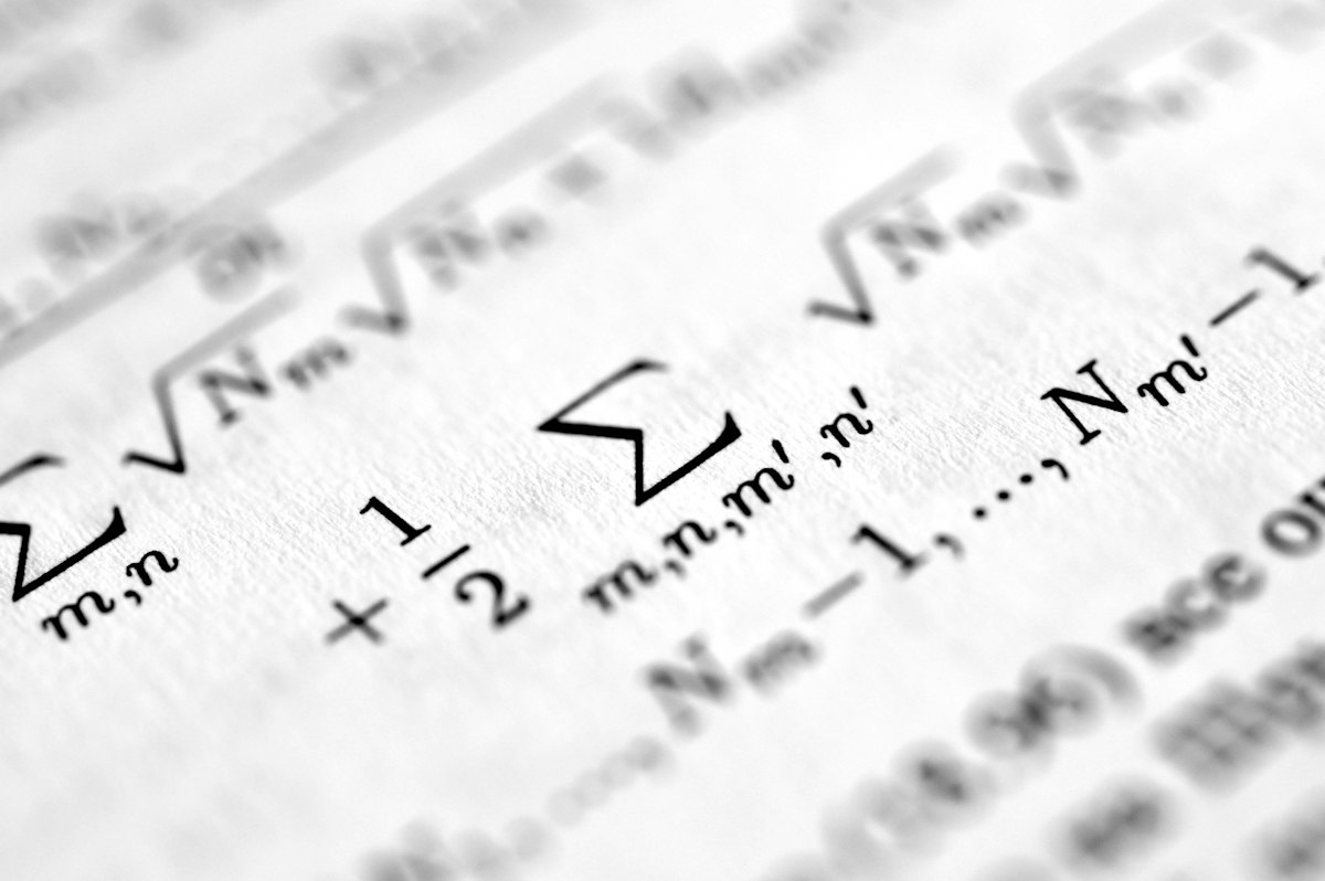 Mathematical equations on a screen with a neural network background